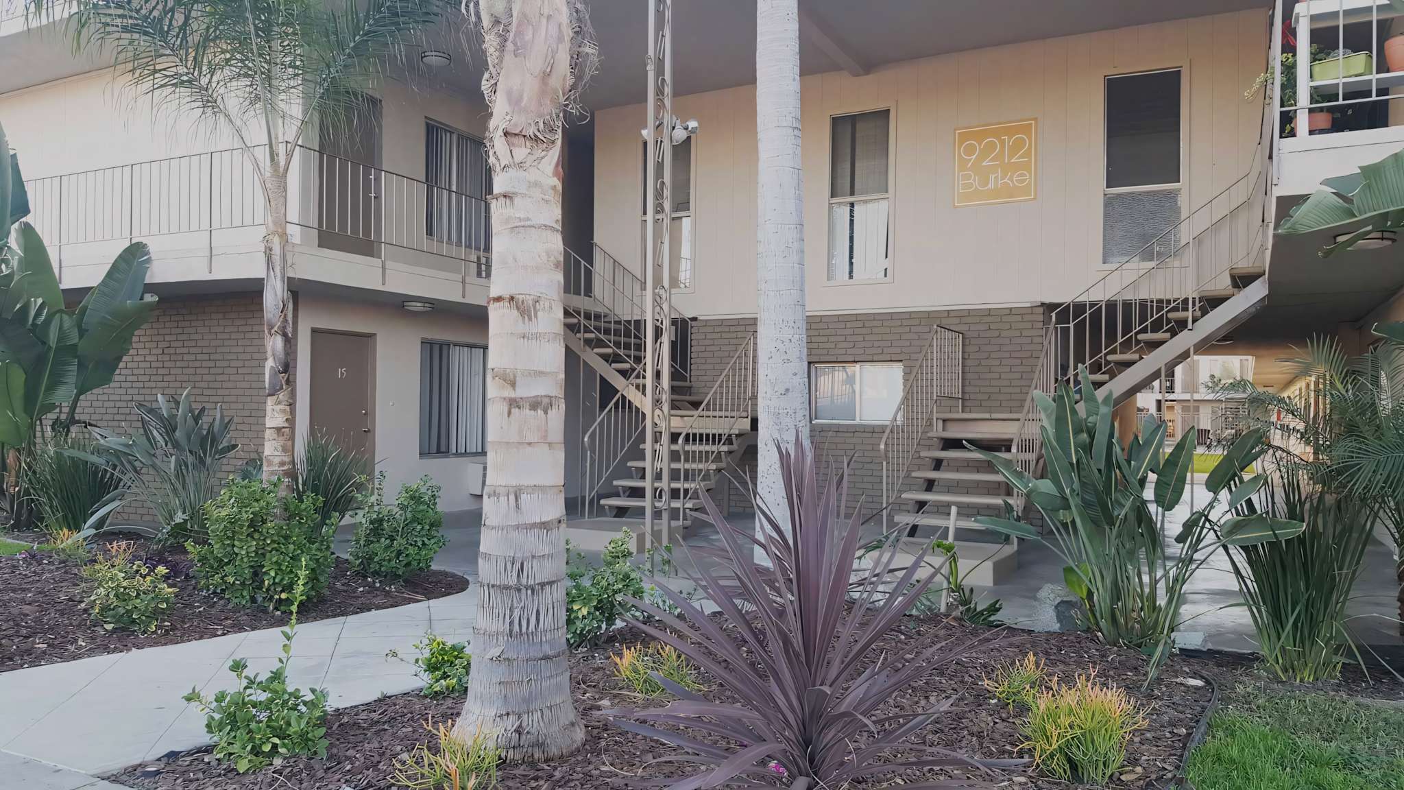 Pico Rivera Collection exterior walkway and multi-level resident stairs