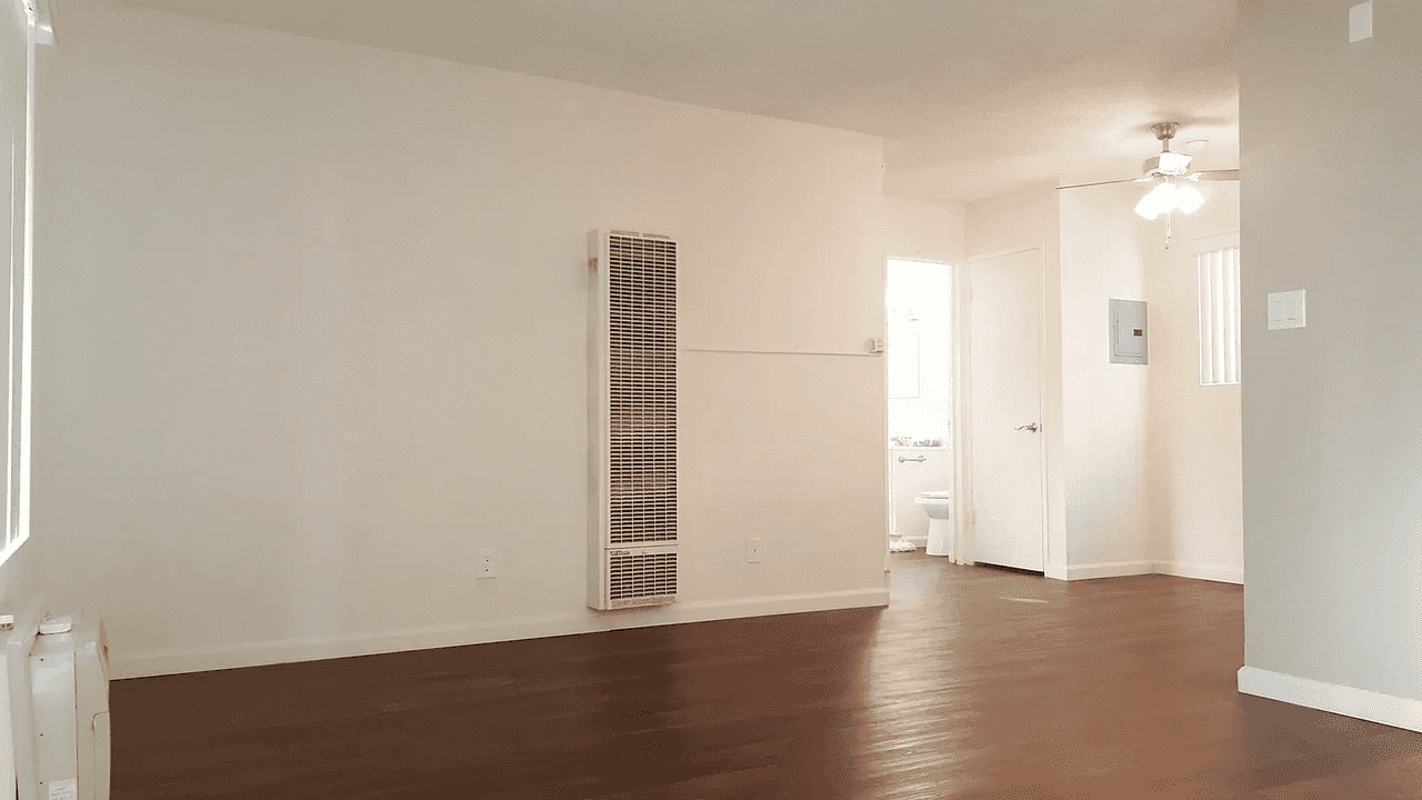 open concept floor plan with hardwood style flooring
