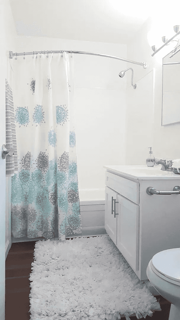 clean modern bathroom with full sized bathtub